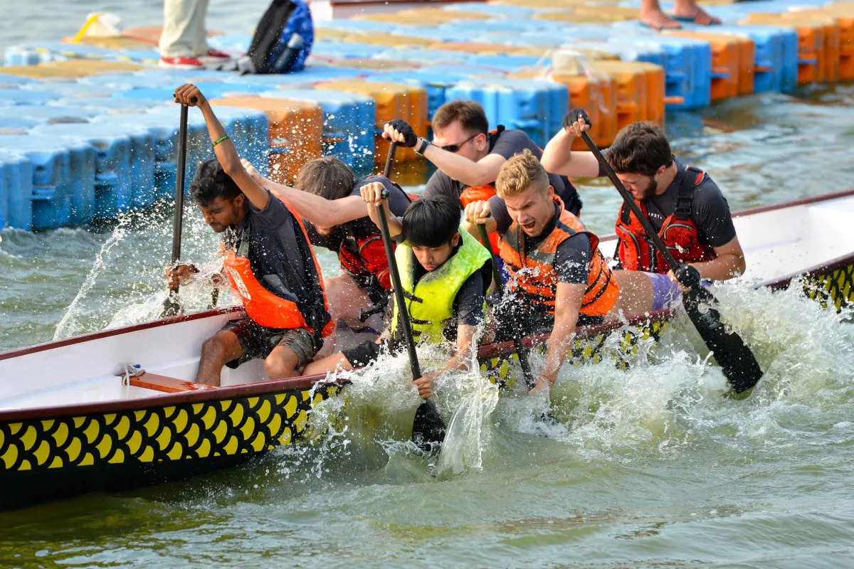 Students taking part in a dragon boat activity