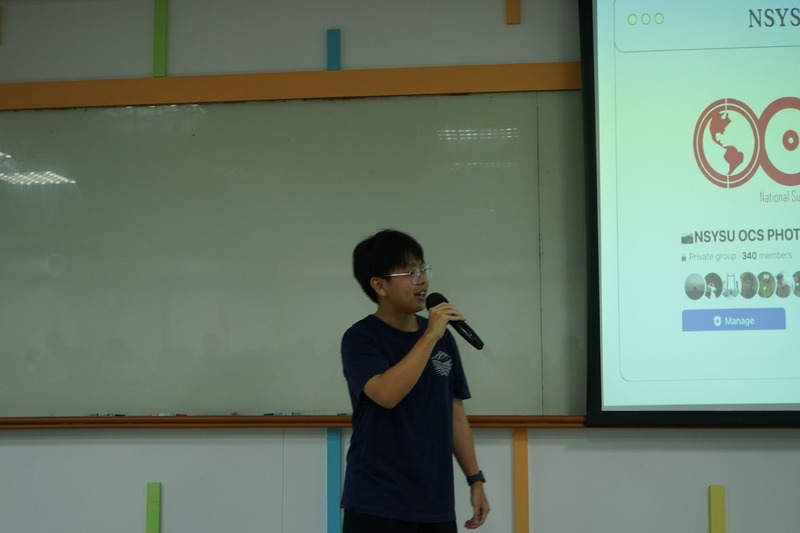 李柏伸進行攝影報告，說明活動攝影、影片製作及照片整理上傳至社團平台供會員下載。📷🎥✨圖片